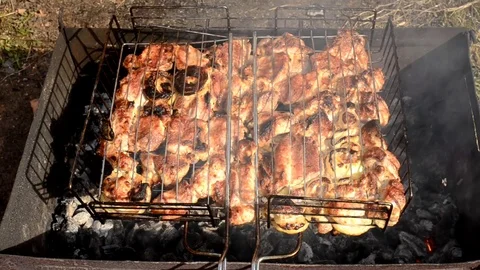 Cooking meat on a barbecue 動画素材 74865849