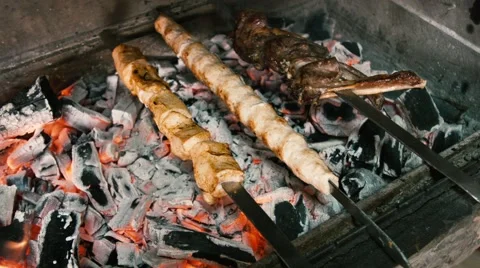 Cooking meat on the coals Video stock 65440115