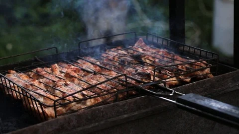 Cooking meat on coals. Stock Footage 127526500