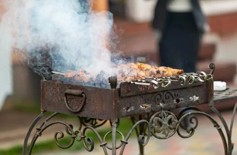 Cooking meat on fire Stock Photos