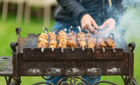 Cooking meat on fire Stock Photos