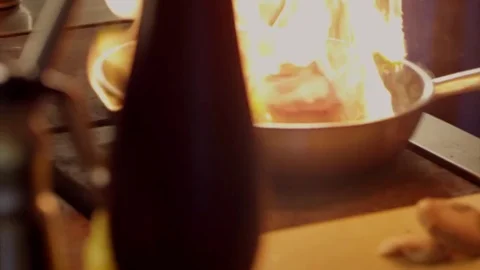 Cooking meat on fire in slow motion Stock Footage 73605439