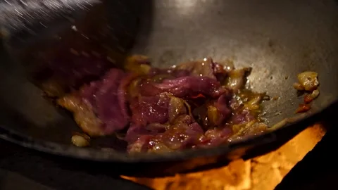 Cooking meat in a frying pan Stock Footage 277519181