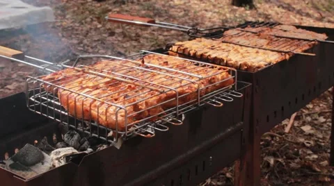 Cooking meat on the grill Stock Footage 50097785
