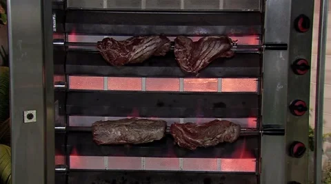 Cooking meat on the grill Stock Footage 55852217