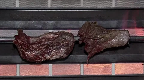 Cooking meat on the grill Stock Footage 55852306