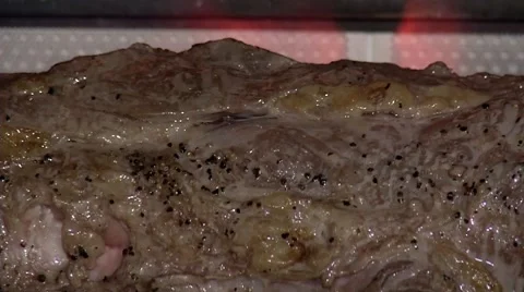 Cooking meat on the grill Stock Footage 55852314