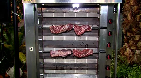 Cooking meat on the grill Stock Footage 55852350