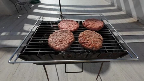 Cooking meat on the grill Stock Footage 271403484