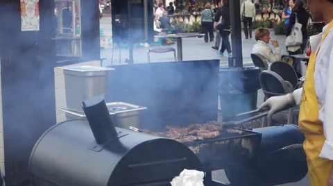 Cooking meat on the grill outside Stock Footage 56269326