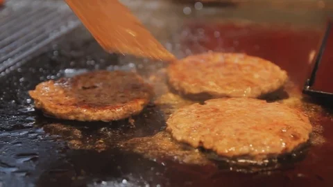 Cooking meat for hamburger. Cooking process, close up. Stock Footage 74680090