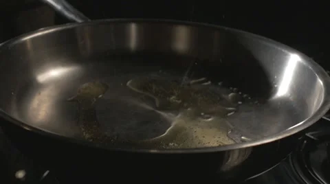 Cooking meat in a hot pan Stock Footage 62640185