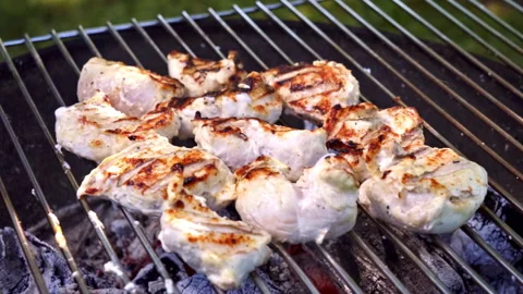 Cooking Meat Over Open Flames, Sizzling Chicken With Flavorful Smoky Char. Video stock 326022379