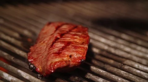 Cooking meat in slow motion Stock Footage 67857215