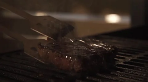 Cooking meat in slow motion Stock Footage 67863152