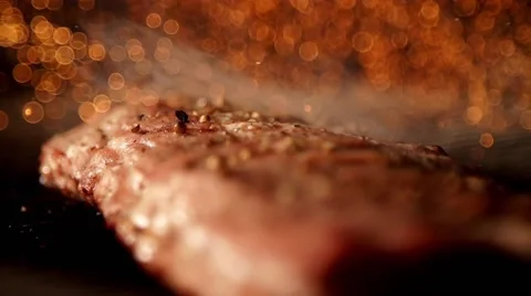 Cooking meat in slow motion Stock Footage 67866906