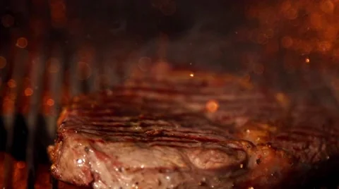 Cooking meat in slow motion Stock Footage 67866912