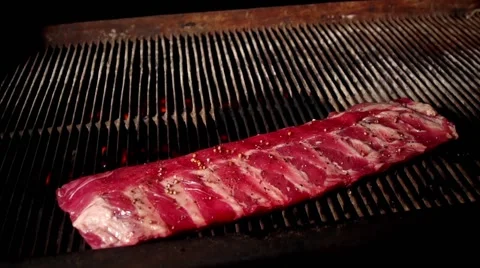 Cooking meat in slow motion Stock Footage 67866965
