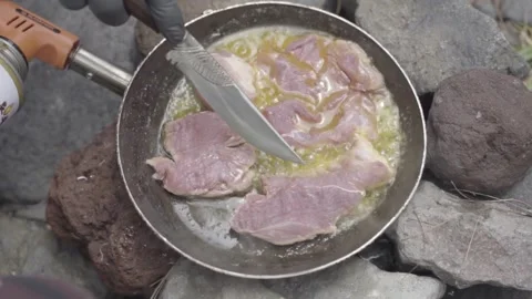 Cooking meat in Teflon Stock Footage 271174751