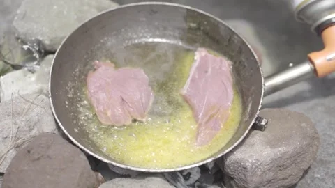 Cooking meat in Teflon Stock Footage 271174948