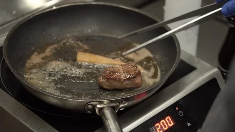 Cooking meat with vegetables Stock Footage 87556701