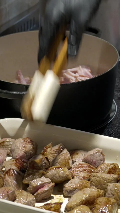 Cooking meat vertical Stockbeeldmateriaal 318106470