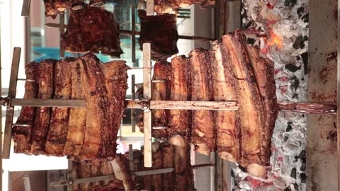 Cooking meat vertical video Stock Footage 95890771