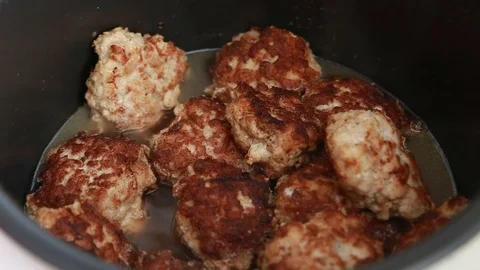 Cooking meatballs in a steamer. Close up Stock Footage 112874798