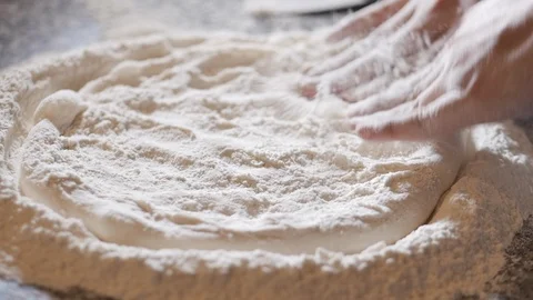 Cooking method, Italian makes real Italian pizza from dough with fingers Stock Footage 127055700