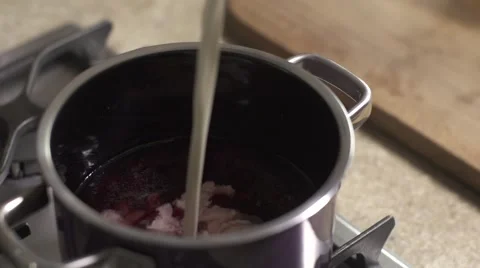 Cooking Milk with sauce Stock Footage 65818802