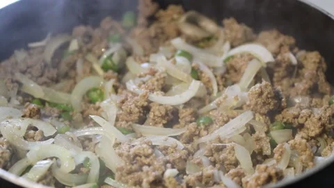 Cooking minced meat and vegetables Stock Footage 134896375