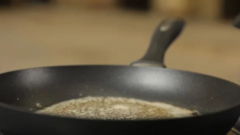 Cooking mixed vegetables on a hot pan Stock Footage 88863079