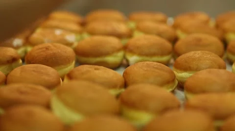 Cooking muffins with cream. Stock Footage 59869584