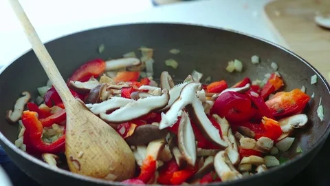 Cooking Mushrooms with vegetables Stock Footage 79409770