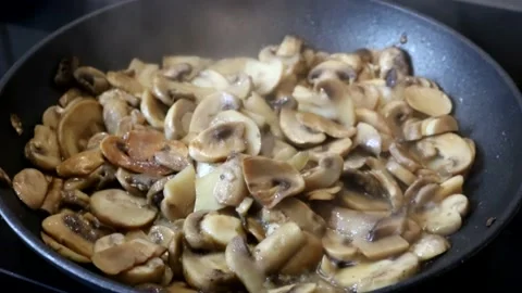 Cooking mushrooms in wine Stock Footage 168040902