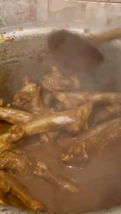 COOKING MUTTON LEG PAYA NIHARI  Stock-Footage 246485052