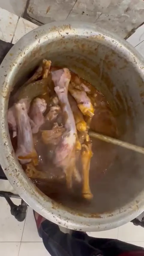 COOKING MUTTON LEG PAYA NIHARI  Stock-Footage 246485068