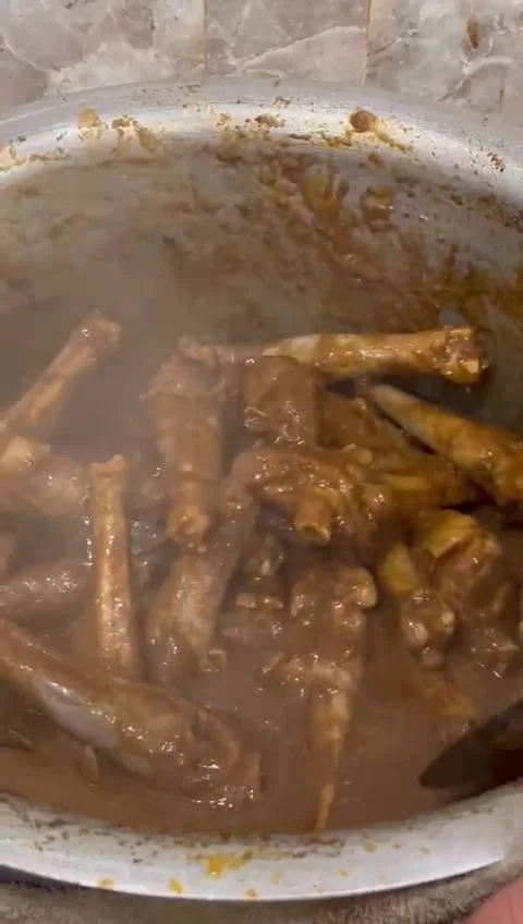 COOKING MUTTON LEG PAYA NIHARI  Stock-Footage 246485098