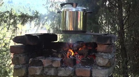 Cooking on natural open fire Stock Footage 56286006