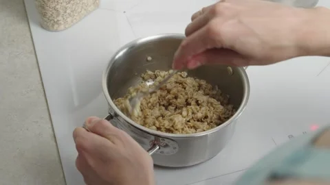 Cooking oatmeal Stock Footage 271616812