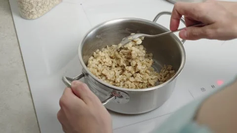 Cooking oatmeal Stock Footage 271616813