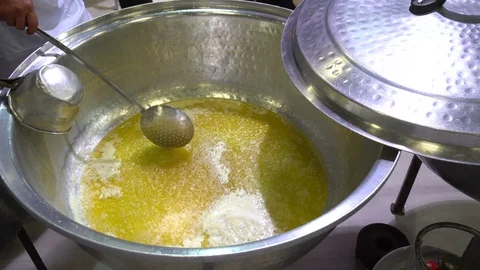 Cooking oil in large cauldron Stock Footage 120988233