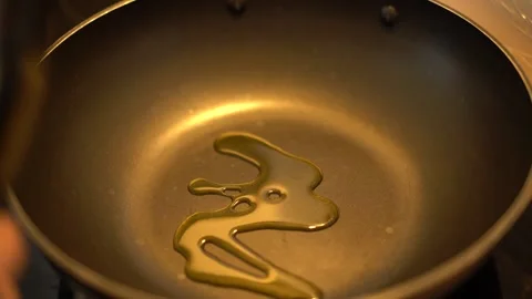 Cooking with olive oil Stock Footage 276328680