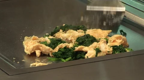 Cooking omelette with spinach Stock Footage 67262916