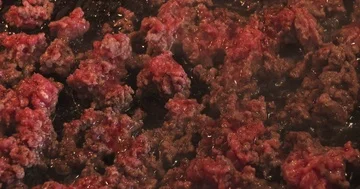 Cooking or Browning Ground Beef in a Skillet Stock Footage 86030570
