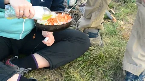 Cooking outdoors on open fire Video stock 69250337