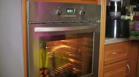 Cooking in oven Stock Footage 12173967