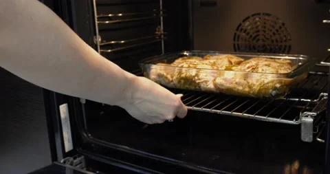 Cooking in a oven 스톡 동영상 145520258