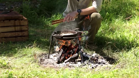 Cooking Over Campfire on Camping Trip Stock-Footage 280122939