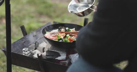Cooking over campfire Stock Footage 163000990